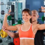 Can'T Reach Fitness Goals Because of Work Man stressed at desk, unable to exercise, reflects on work hindering fitness goals
