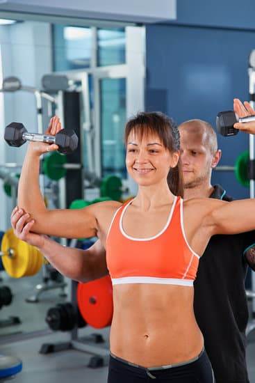 Man stressed at desk, unable to exercise, reflects on work hindering fitness goals