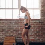Screenshots showcasing the step-by-step process of downloading Xbox Fitness workouts