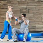 Why You Don'T Achieve Your Fitness Goals Image of person struggling to exercise with the text 'WHY YOU DON'T ACHIEVE YOUR FITNESS GOALS'