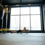 Don't give up on your fitness goals - A group of people working out together, motivating each other