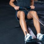 How to Start a New Fitness Routine Photo of person lacing up running shoes with text: 'How to start a new fitness routine'