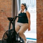 How to Get Motivated to Lose Weight and Get Fit Image of a woman working out with the text 'How to Get Motivated to Lose Weight and Get Fit'