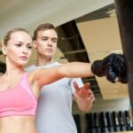 A breathtaking underwater fitness routine: divers gracefully practicing yoga, pilates, and cardio in the deep sea